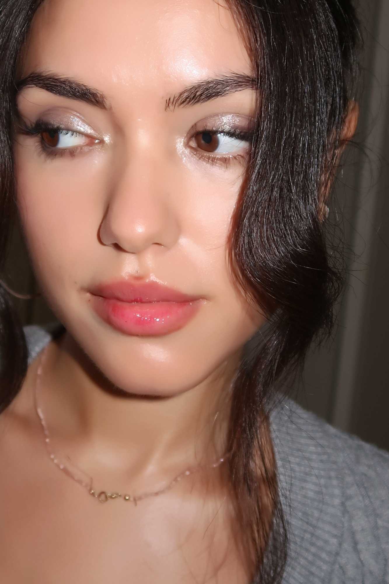 lip tint in baby pink on model